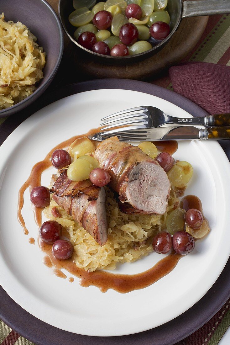 Pheasant breast with bacon, sauerkraut and grapes