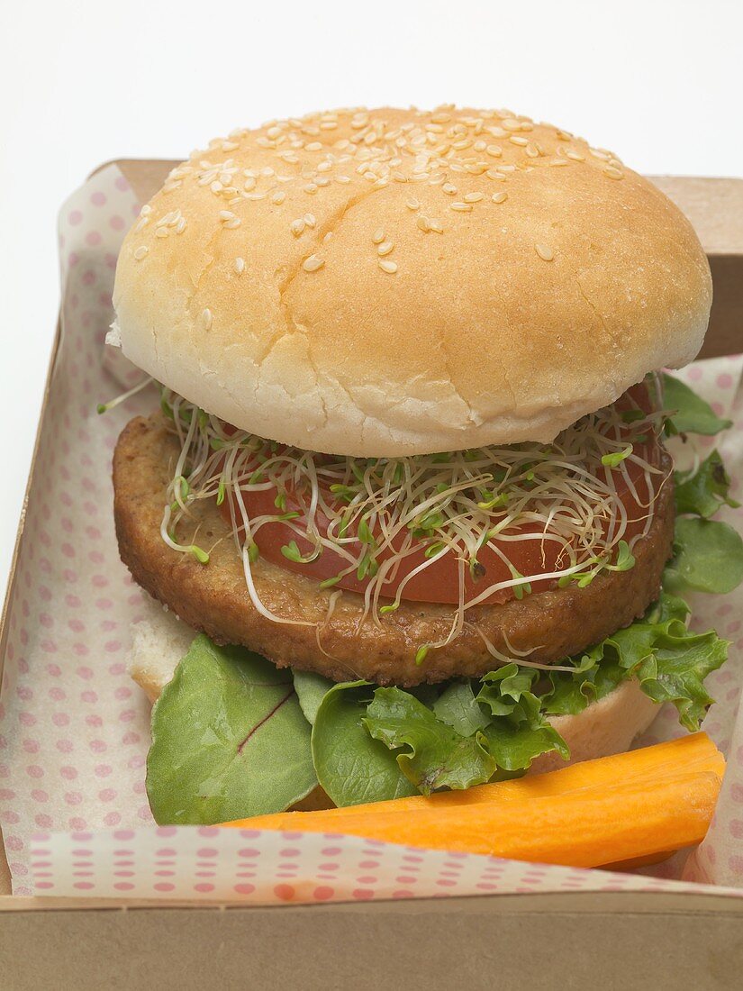 Burger with sprouts in cardboard box