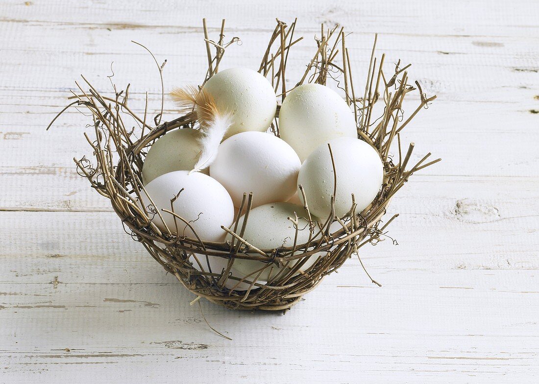 White eggs in a basket