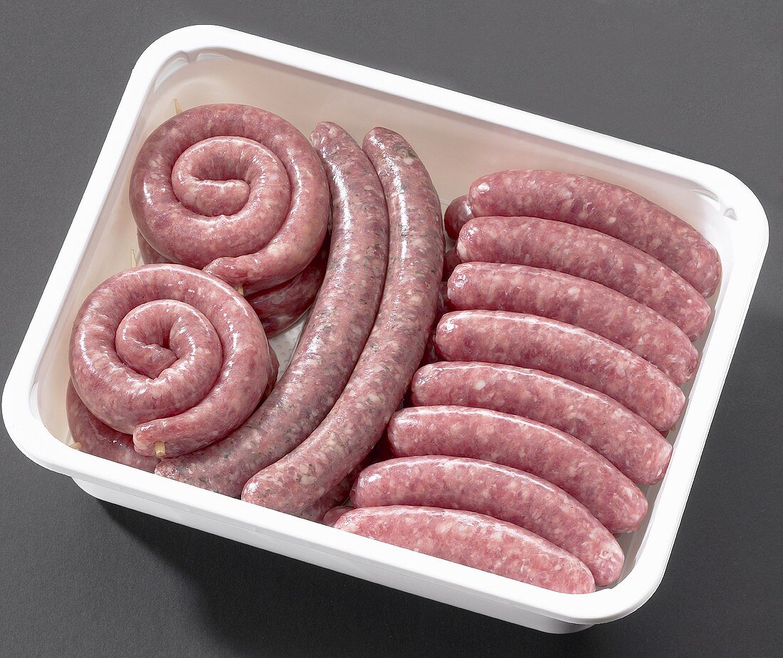 Sausages in plastic container