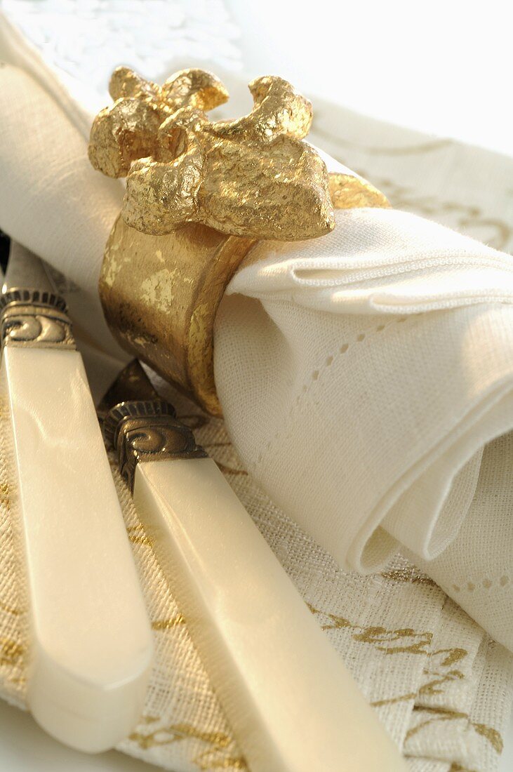 Fabric napkin with gold napkin ring (Christmas)