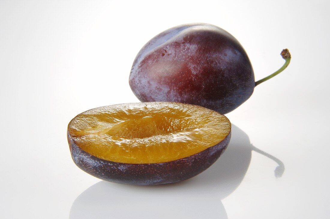 Whole plum and half a plum