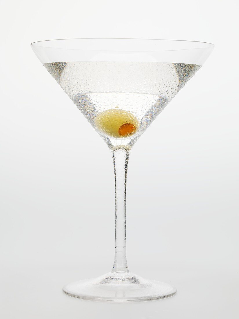 Martini with green olive