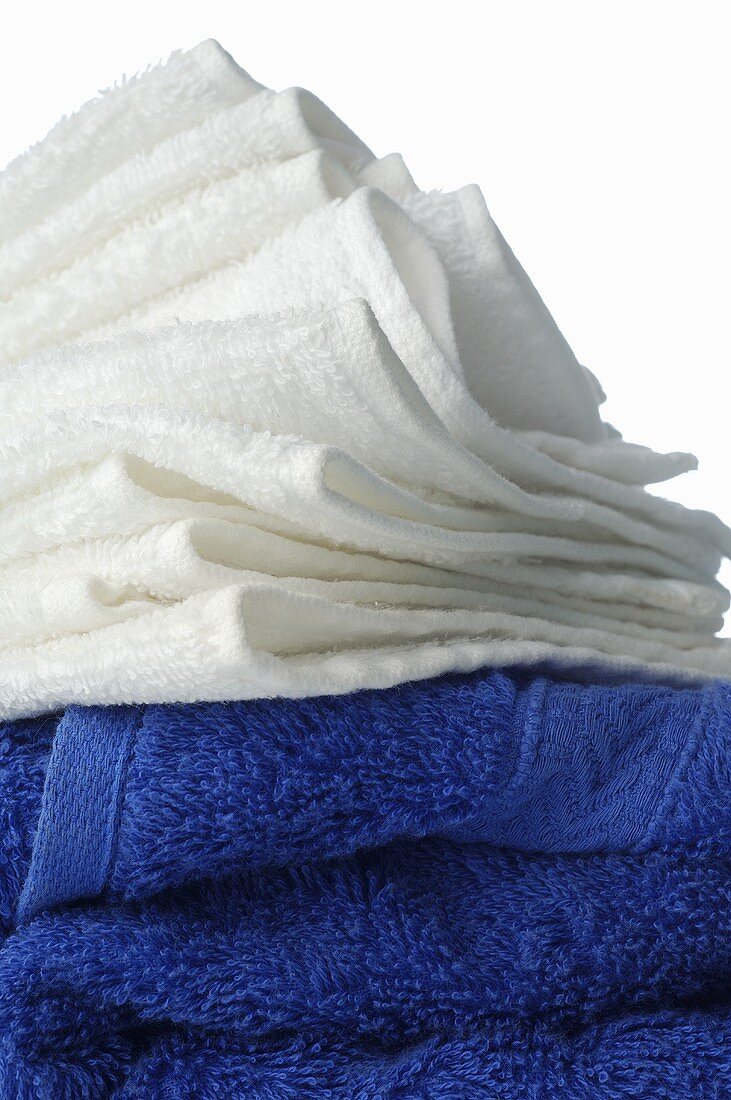 A stack of white and blue towels