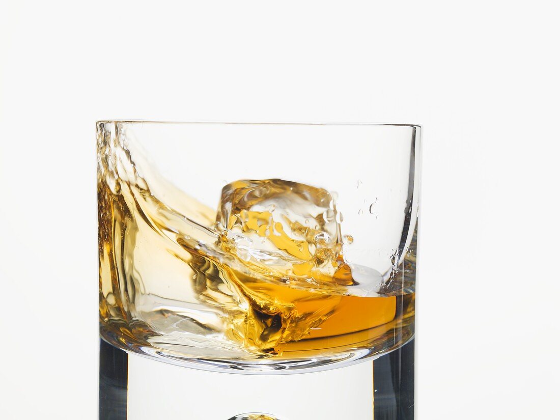 Whisky swirling in a glass