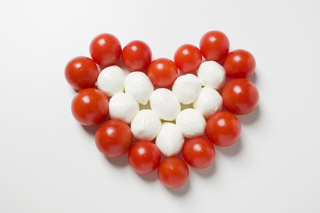 Tomato and mozzarella forming a heart