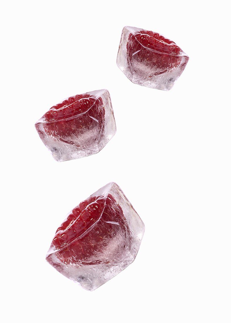 Three raspberry ice cubes