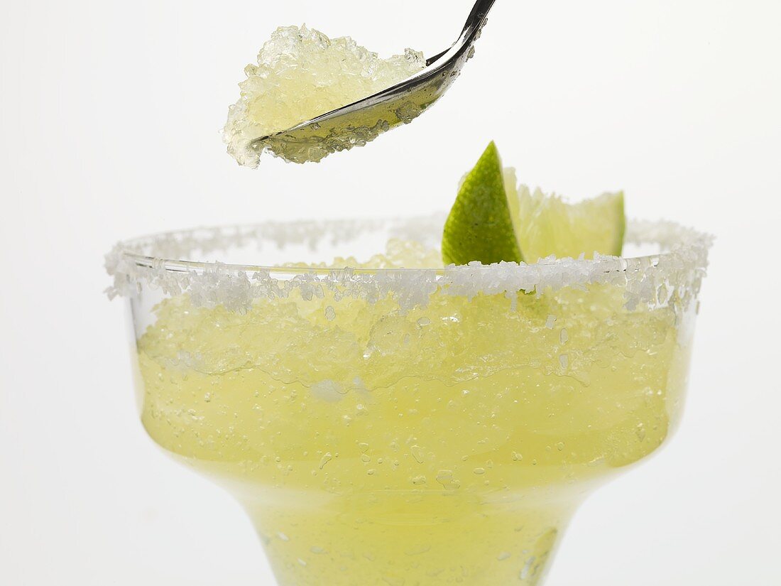 Frozen Margarita in glass and on spoon