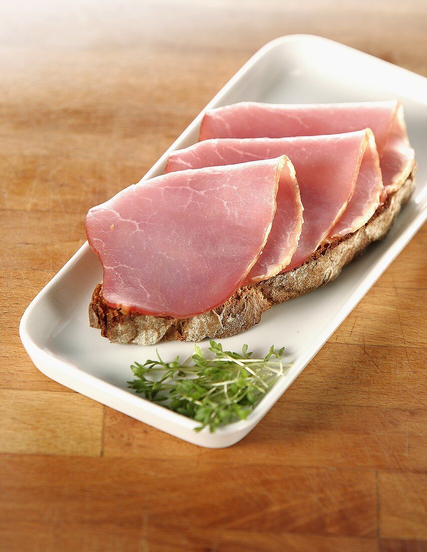 Open ham sandwich and fresh cress