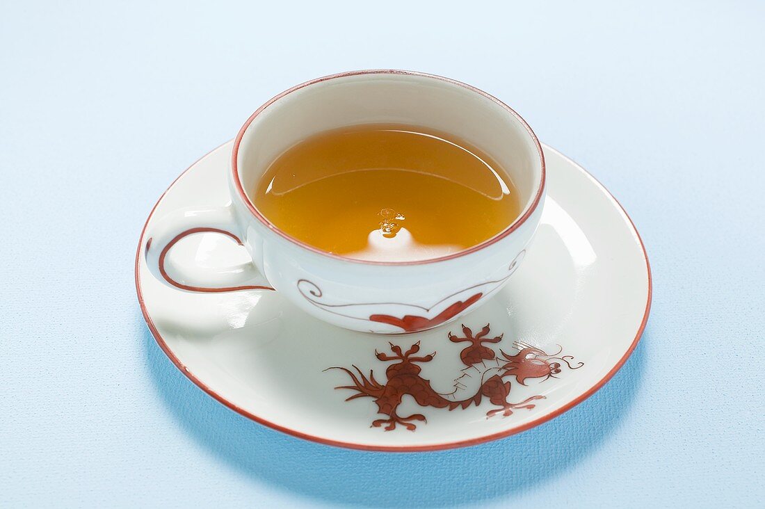 Tea in Asian cup and saucer
