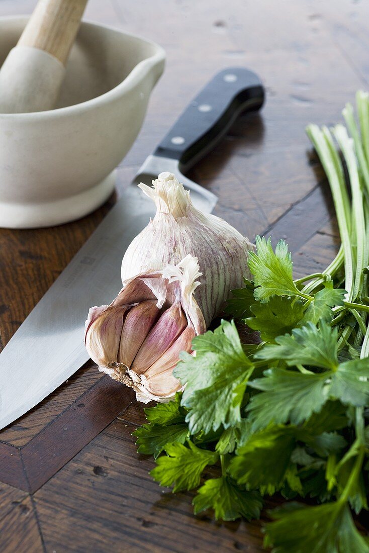 Parsley, garlic and knife