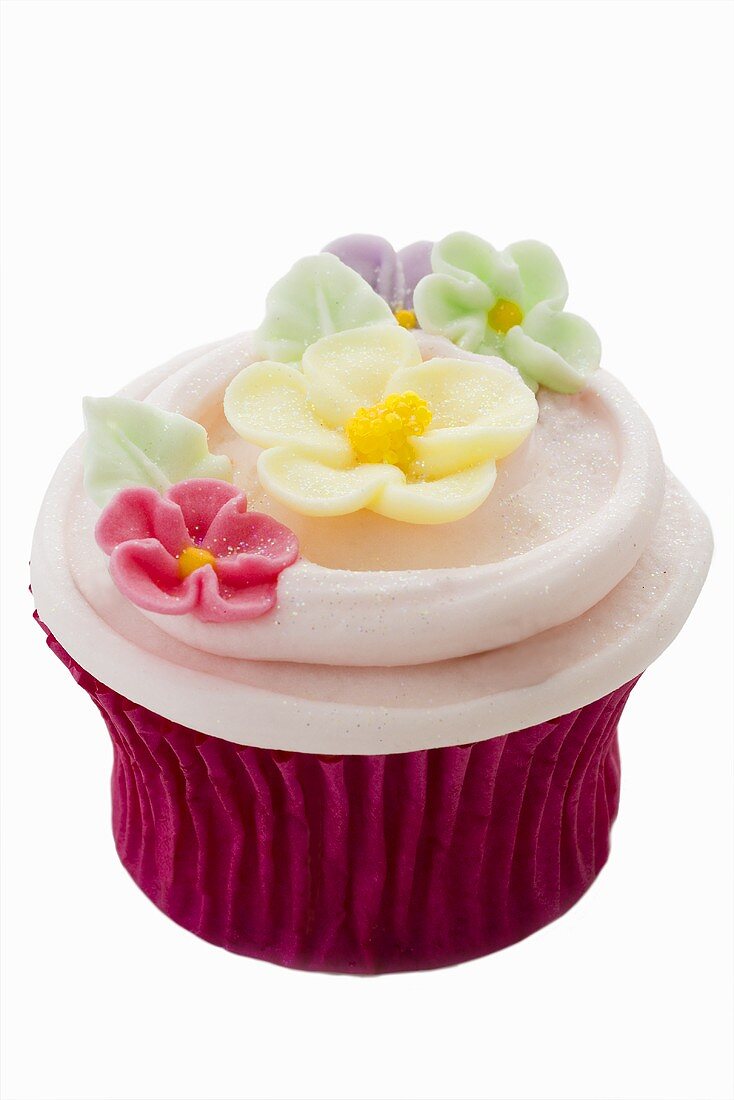 Cupcake with coloured sugar flowers