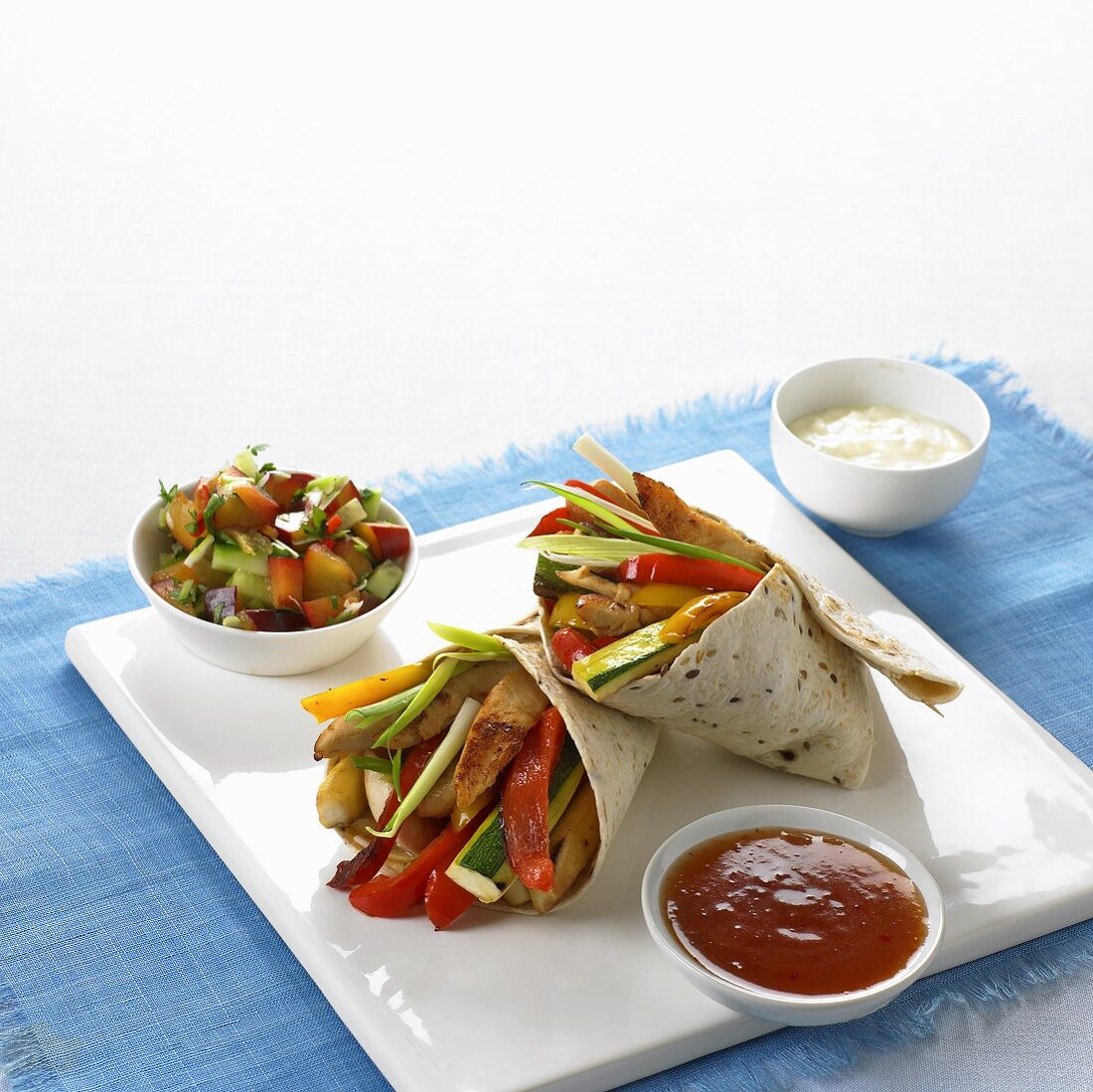 Chicken and vegetable fajitas with spicy plum dip