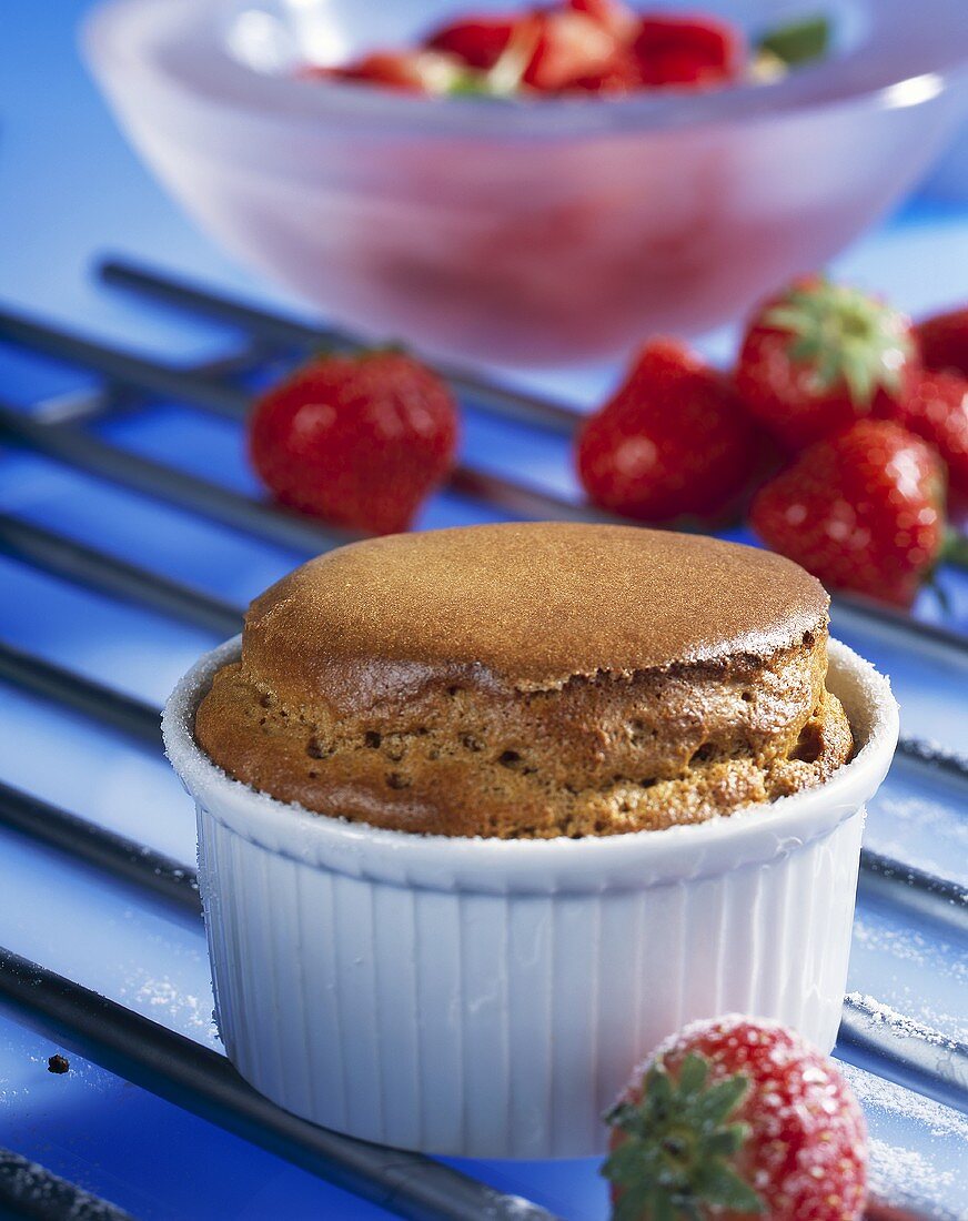 Ginger soufflé with fresh strawberries