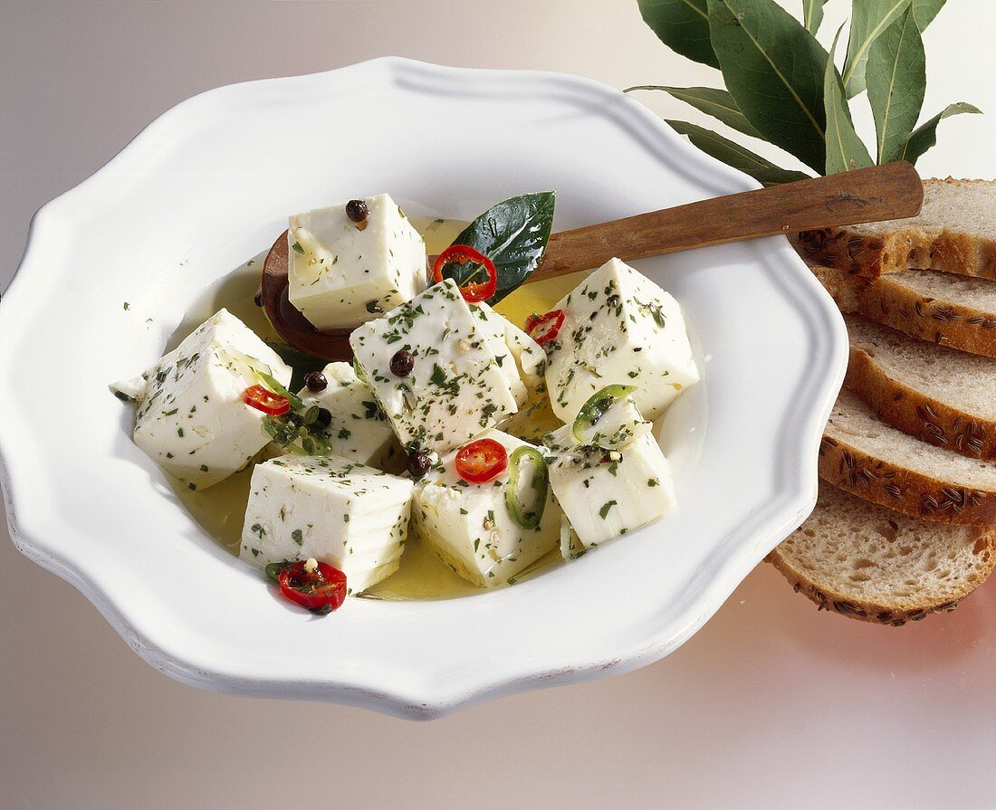 Feta cheese in herb marinade