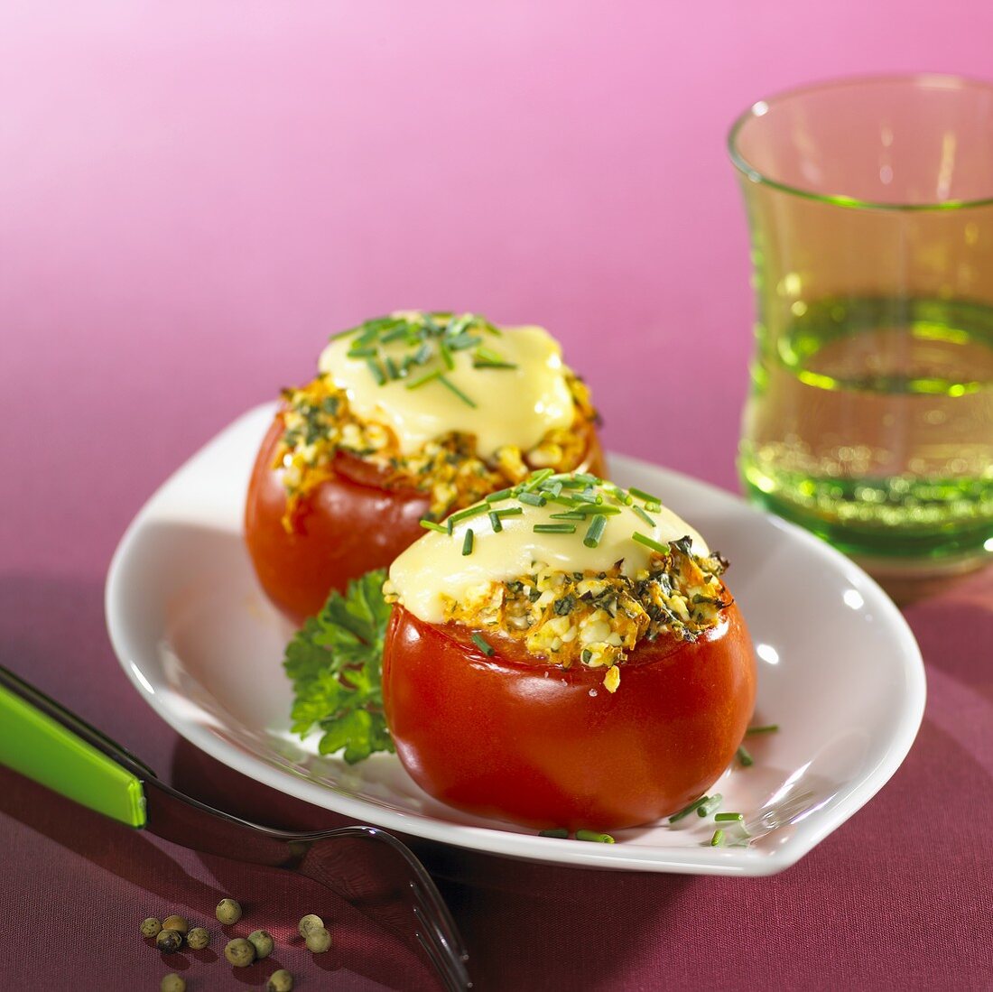 Stuffed tomatoes with melted cheese