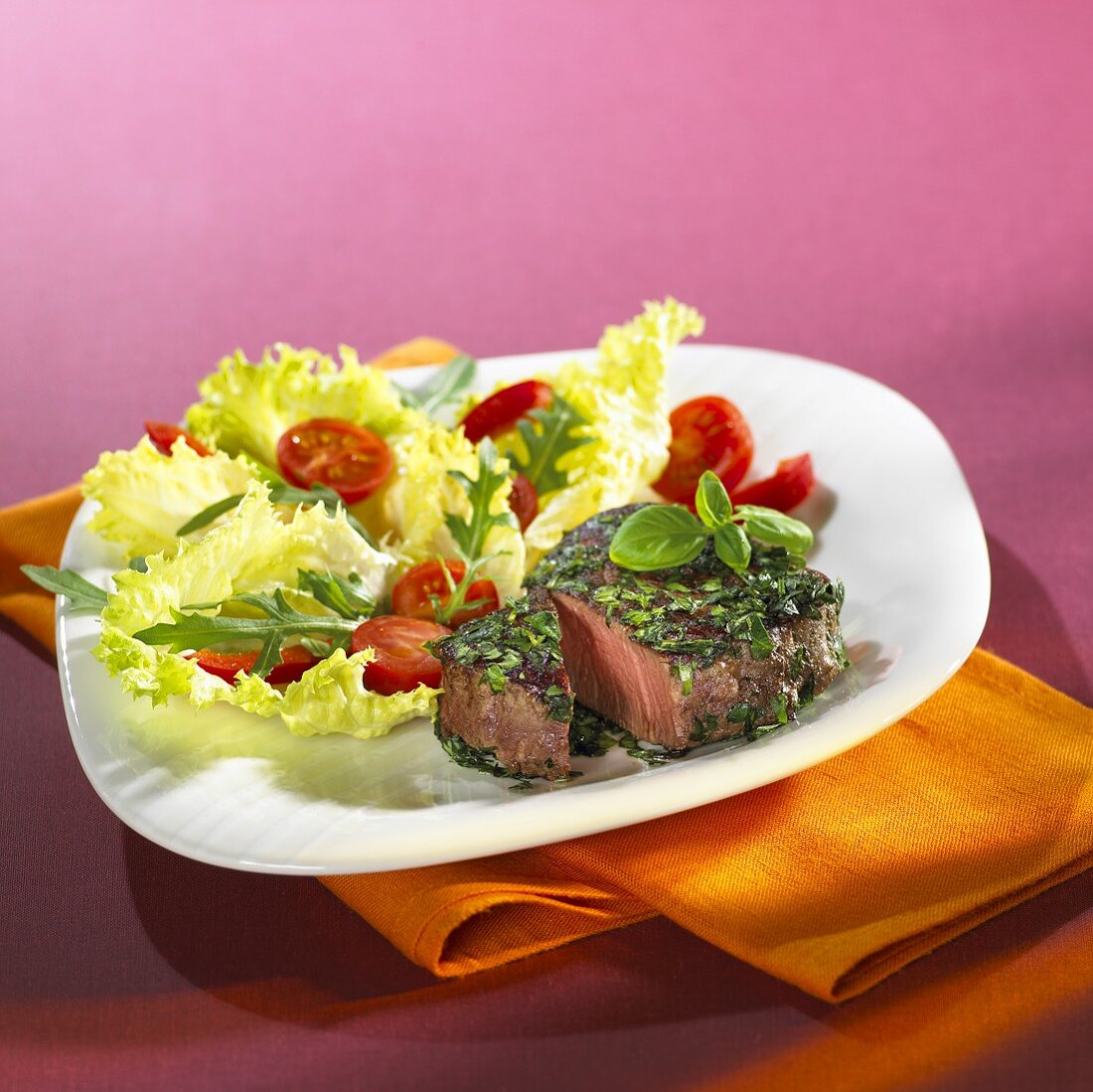 Beef fillet with basil and salad