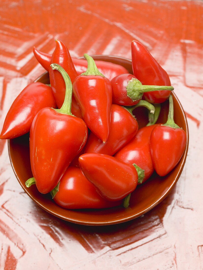 Red chillies in a red dish