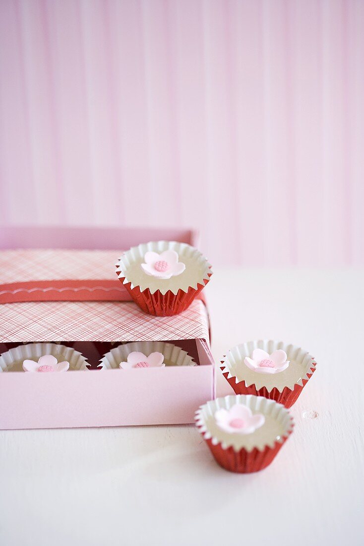 Mini Candies with Candy Flowers in and Beside a Box