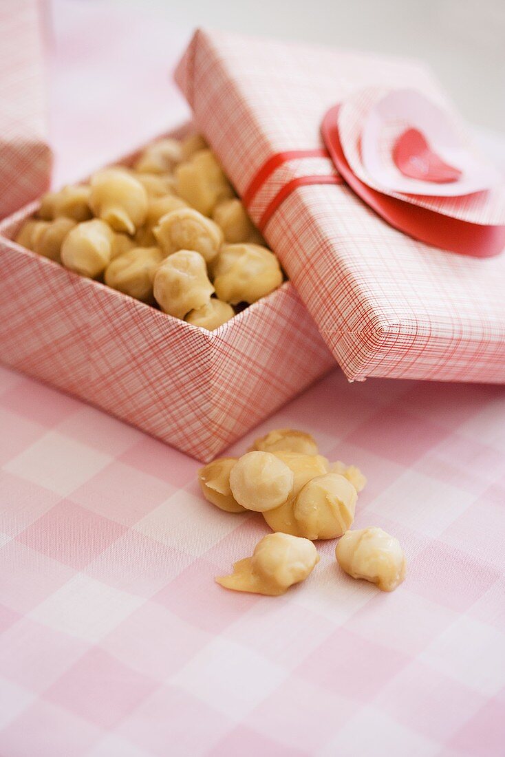 Opened Box of Toffee Covered Macadamia Nuts; For Valentine's Day