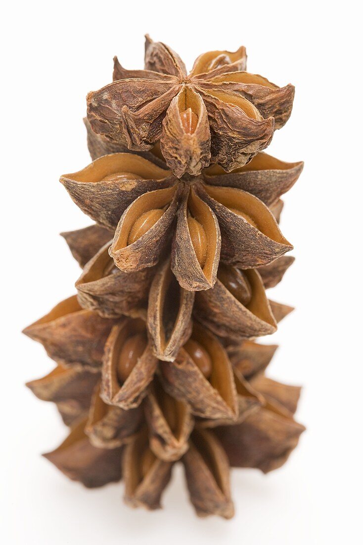 Several star anise, stacked