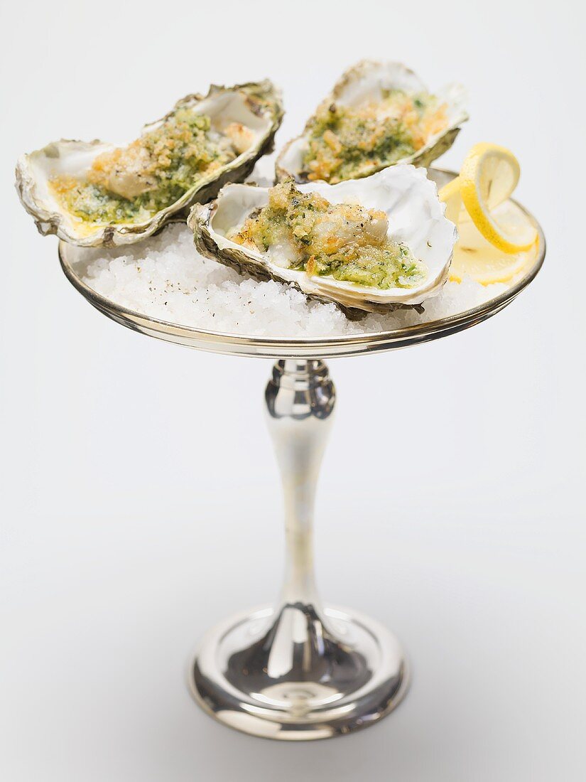 Oysters au gratin on silver stand