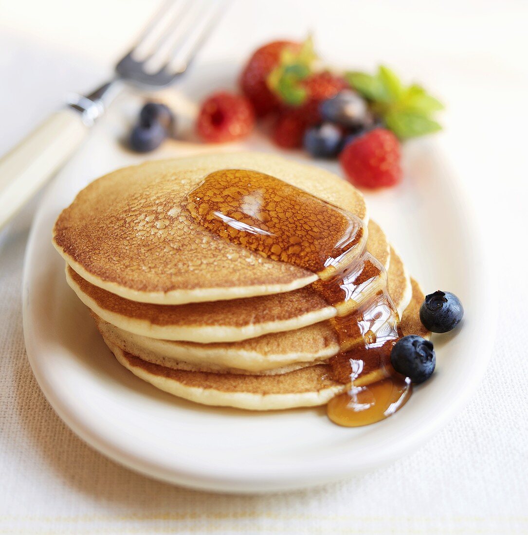 Stack of Pancakes with Maple Syrup with Berries