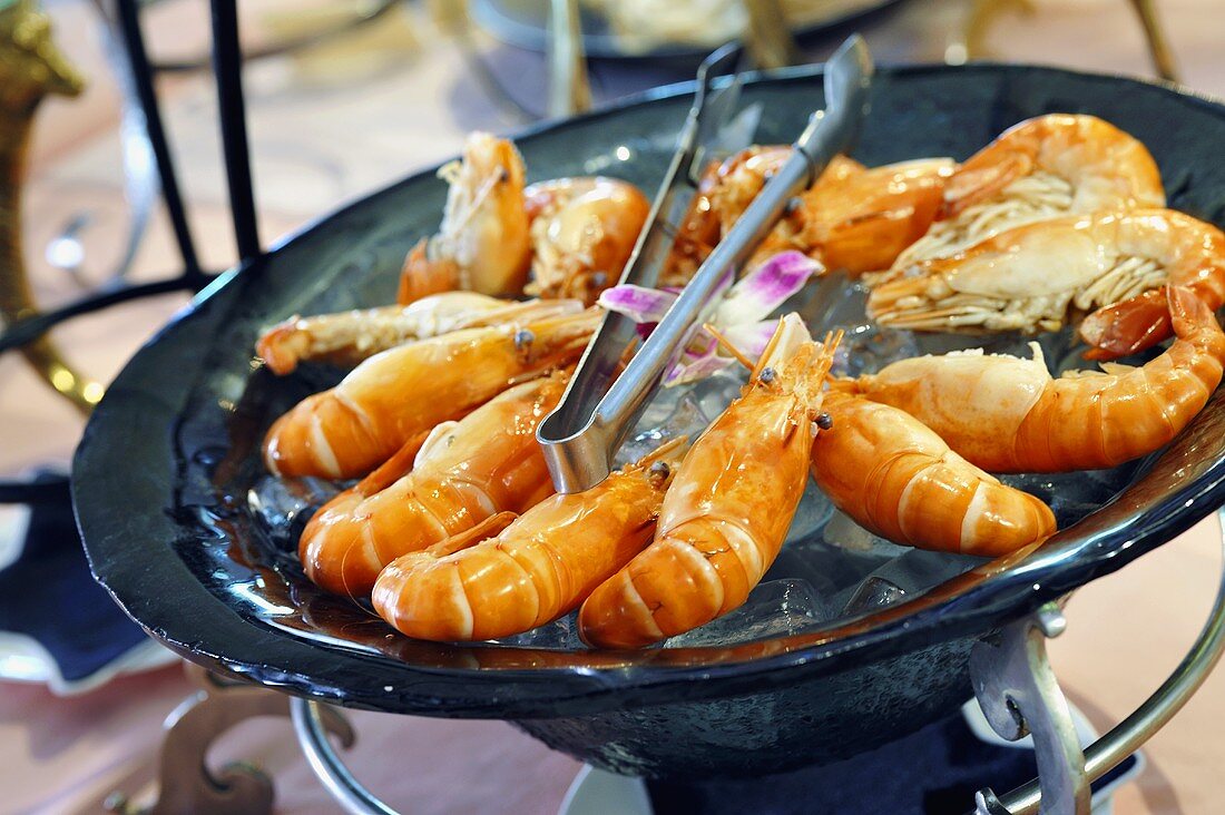 Cooked prawns on ice cubes, Thailand