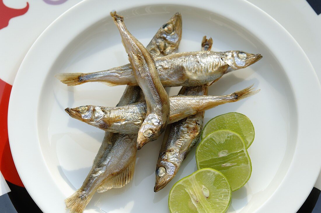 Grilled and salted capelin