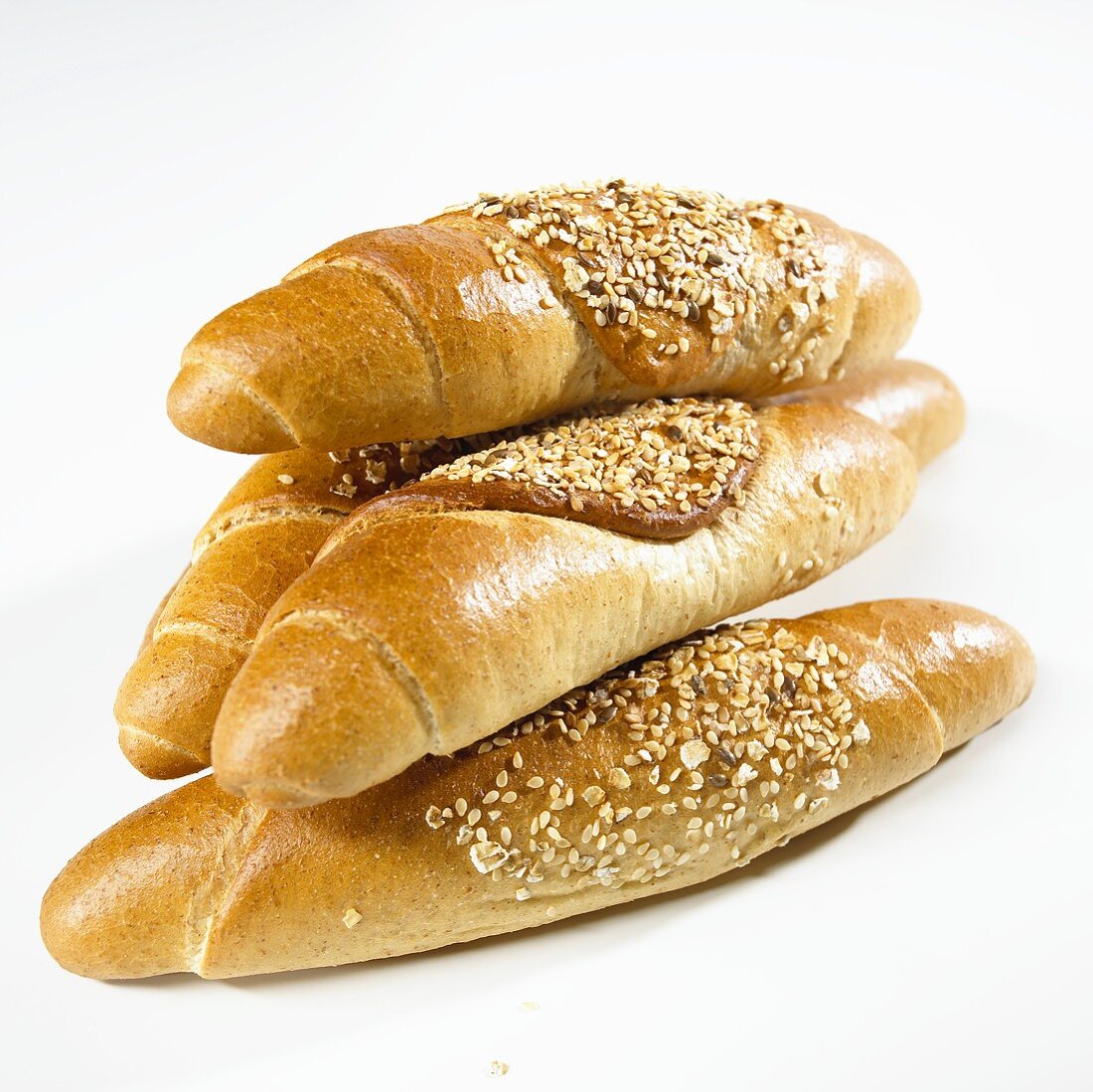 Several grain baguettes, stacked