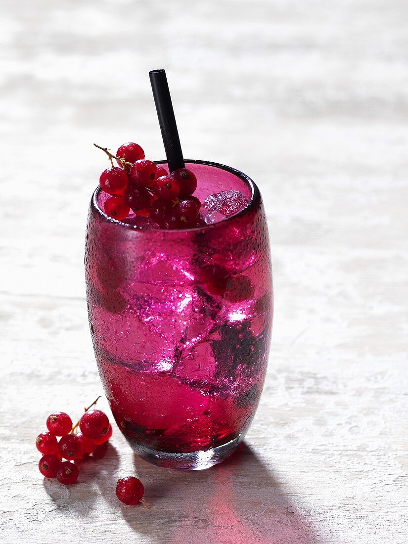 A cocktail with redcurrants