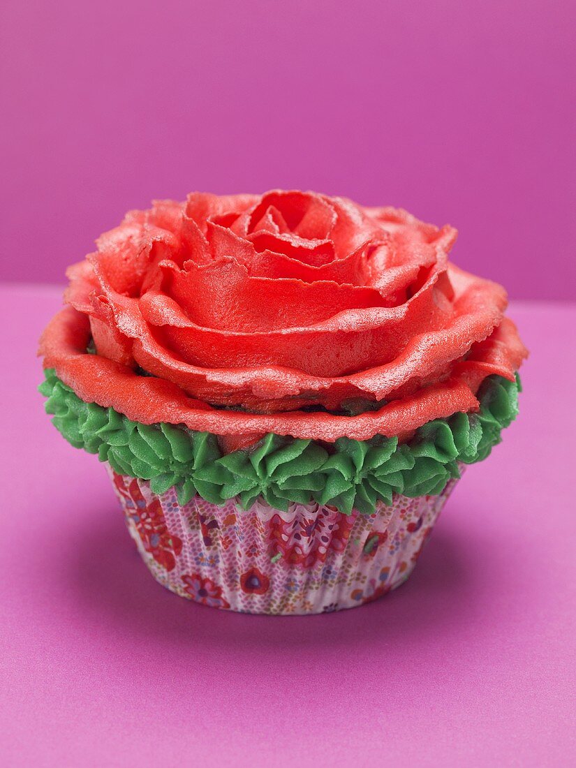 Cupcake with red marzipan rose