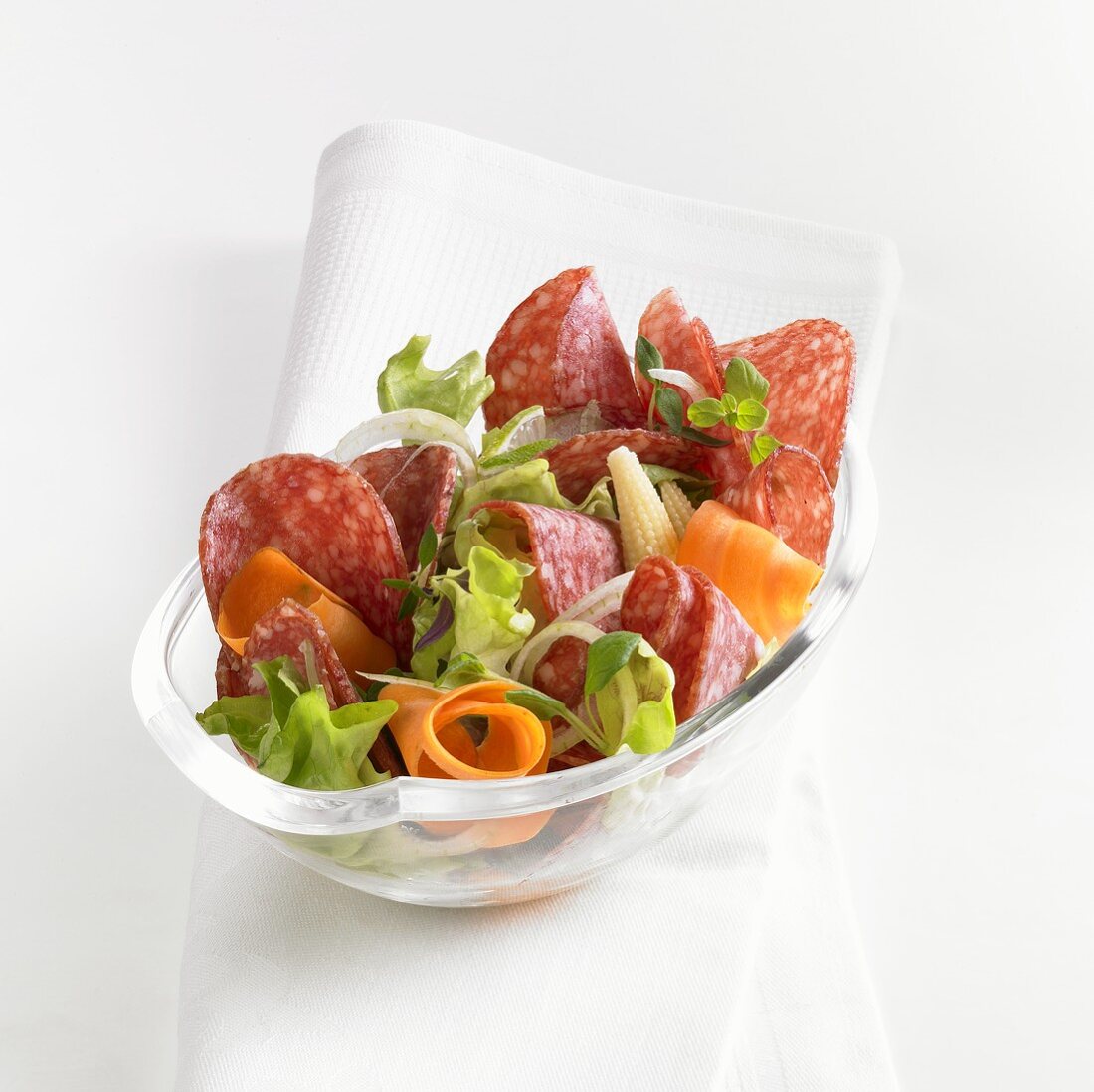 Salami salad with carrots and baby corn