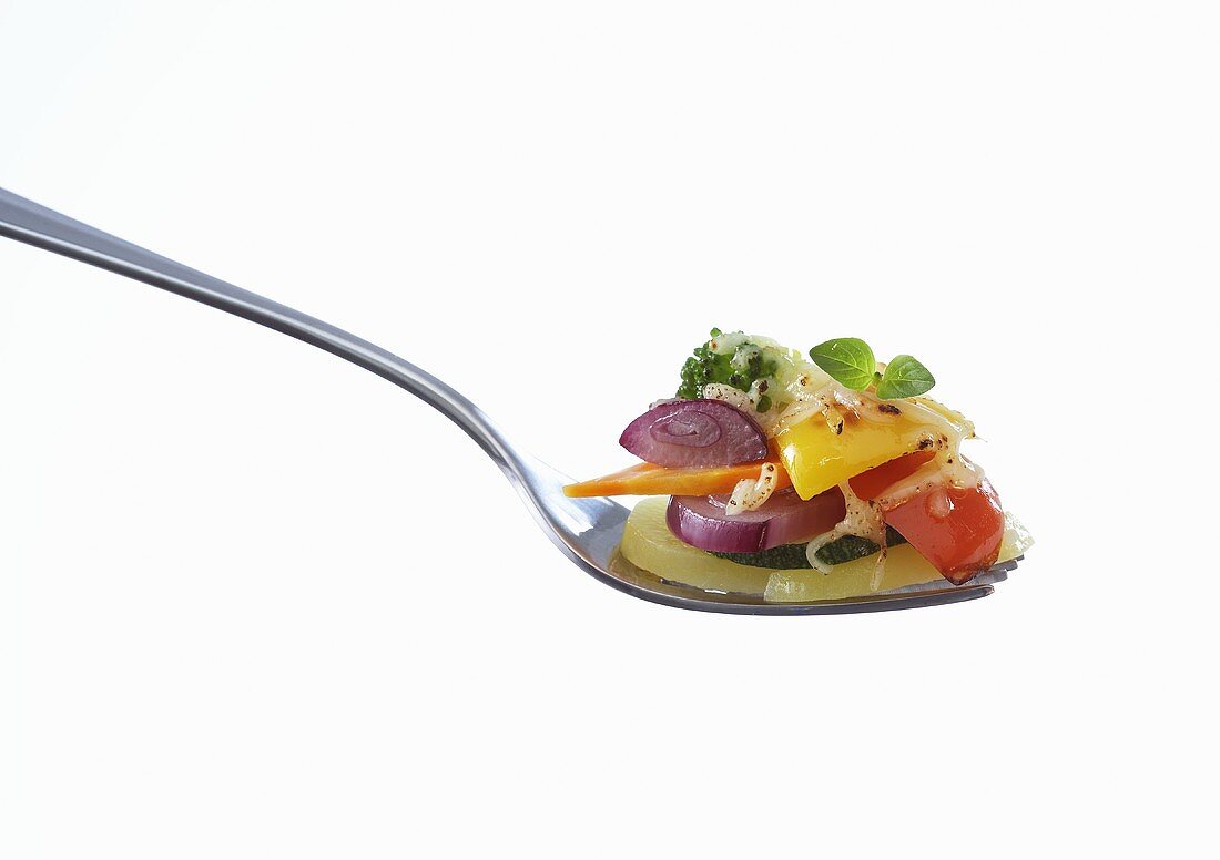 Vegetable gratin on fork
