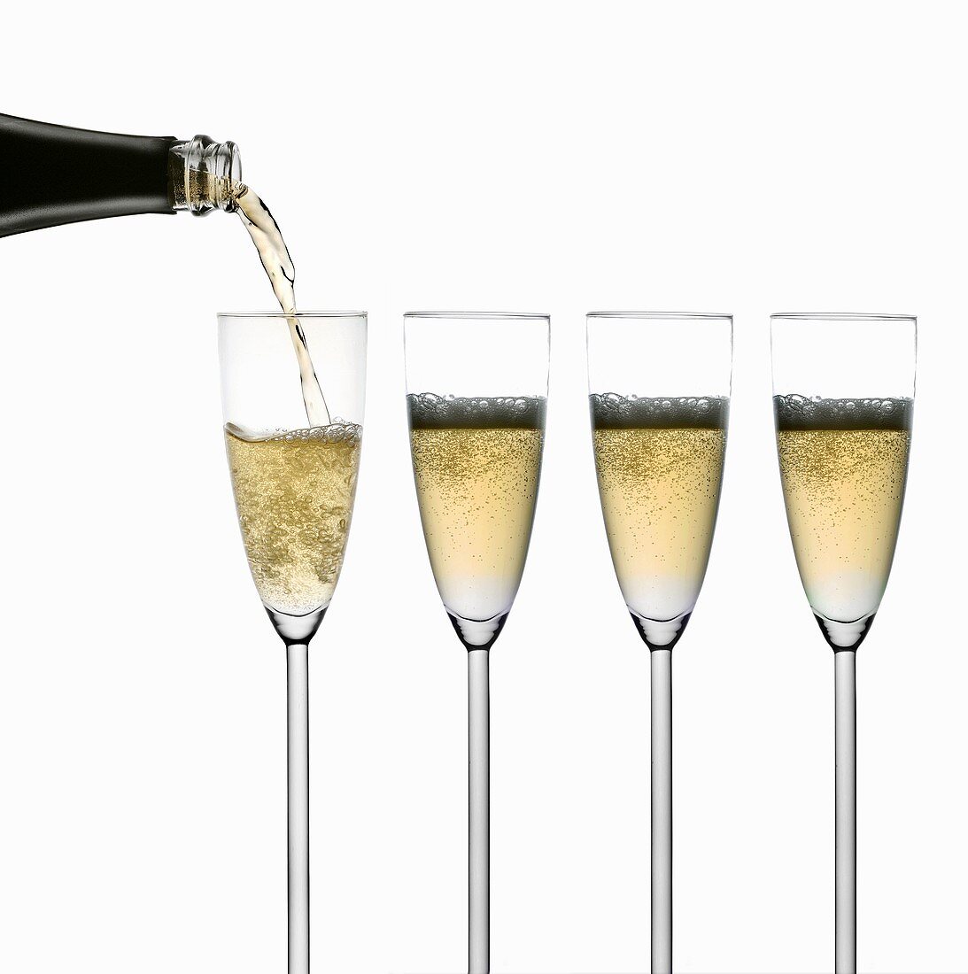 Pouring sparkling wine into glasses