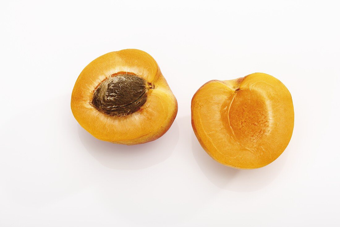 Apricot, halved (overhead view)