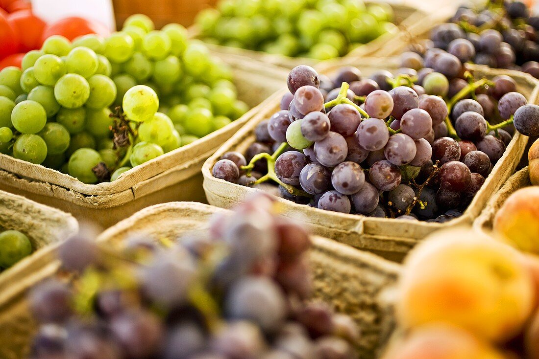 Cartons of Red and Green Grapes