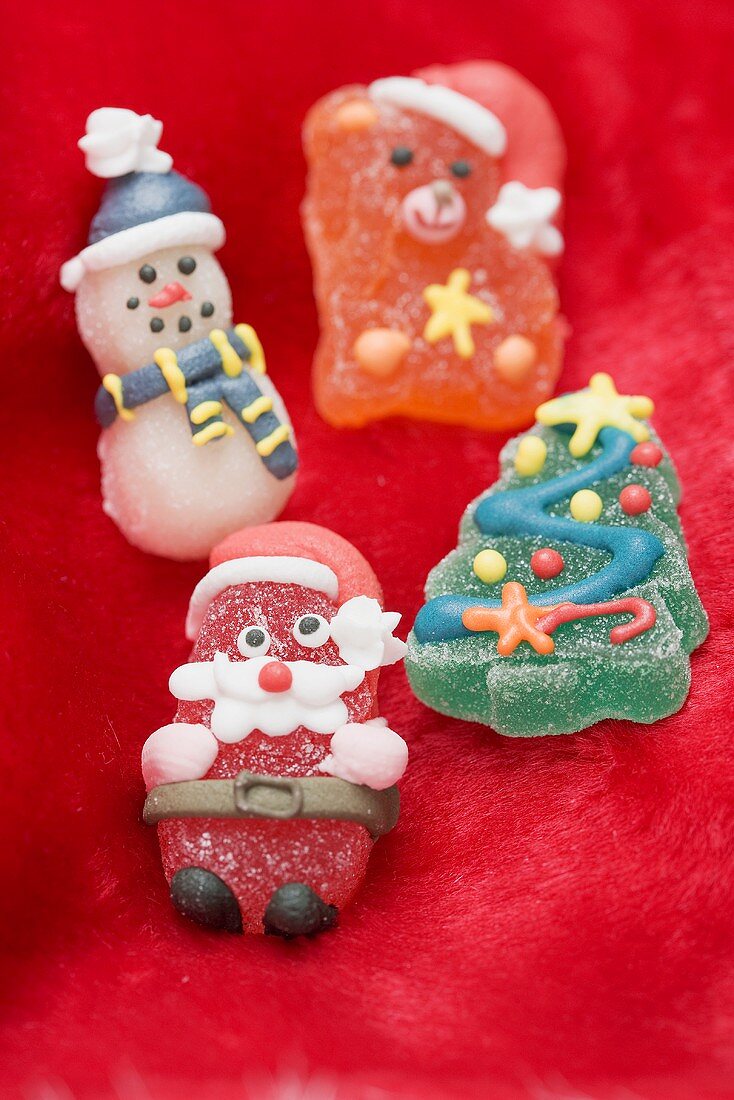 Christmas sweets on red fabric
