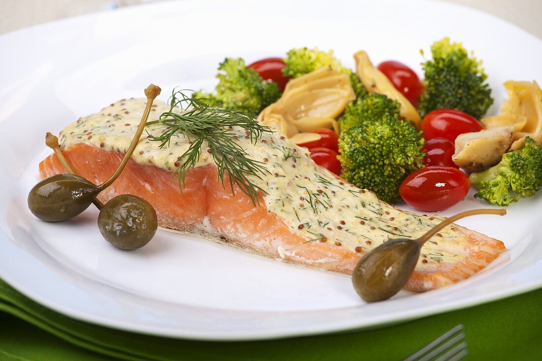 Salmon fillet with mustard & dill sauce, vegetables, caper berries