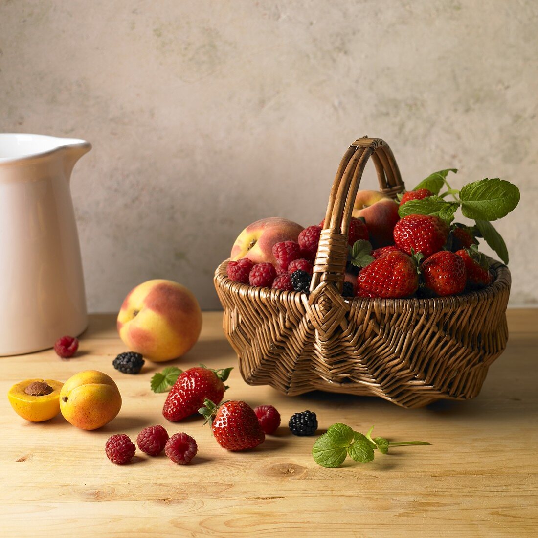 Assorted fruit and berries in basket