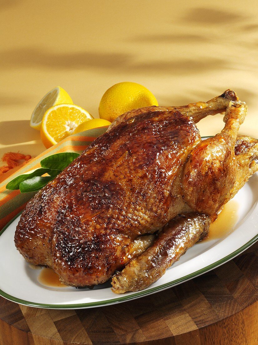 Orange-glazed duck