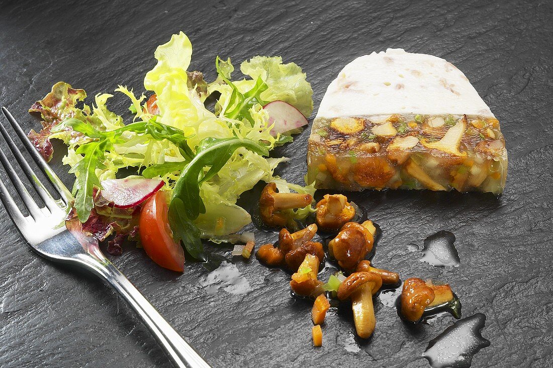 Chanterelle terrine with mixed salad leaves