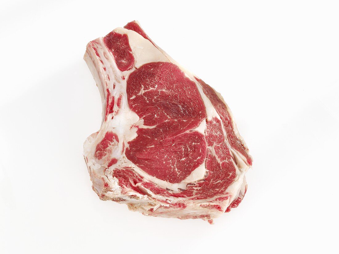 Rib eye steak on white background