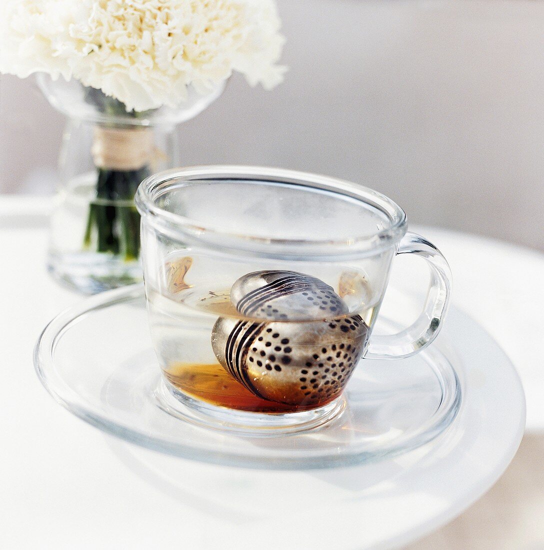 Tea infuser in a cup