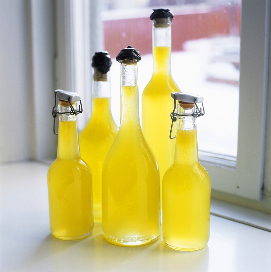 Home-made lemonade in several bottles