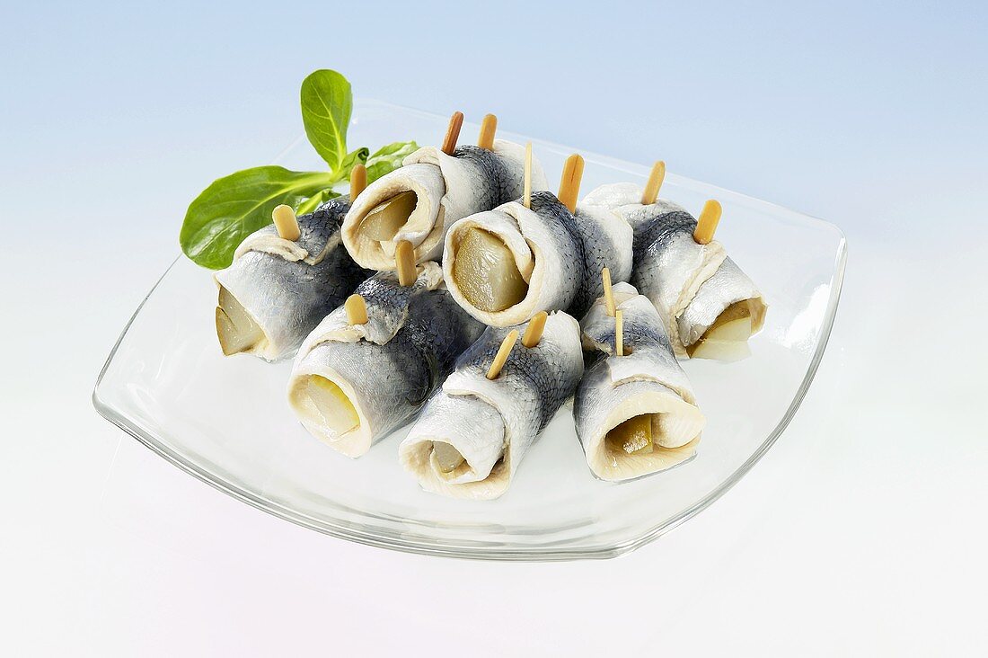 Rollmops on glass plate