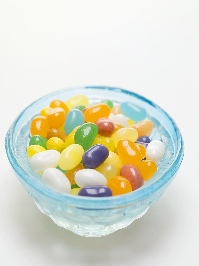 Jelly beans in blue glass dish