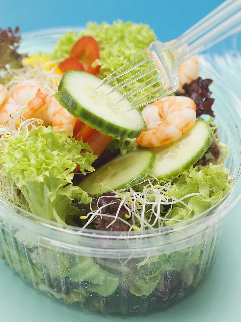 Mixed salad leaves with prawns and vegetables to take away