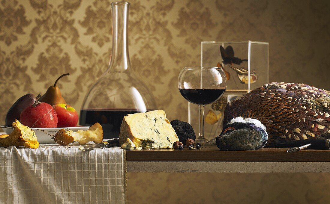 Still life with pheasant, cheese and wine