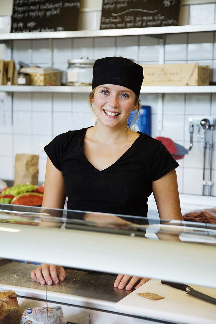 Shop assistant in a food shop (Sweden)